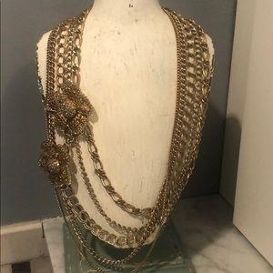 Henri Bendel necklace w/silver and gold flowers.